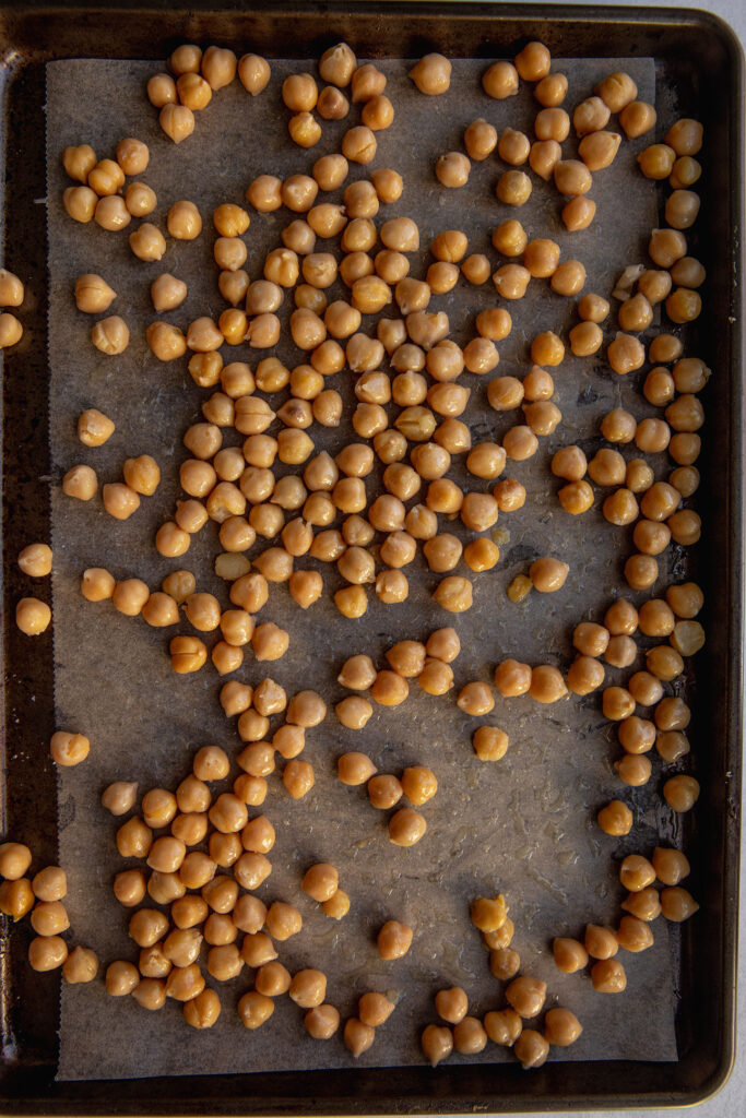 Chickpeas coated in oil.