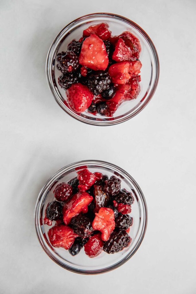 Dividing the fruit filling between baking dish.
