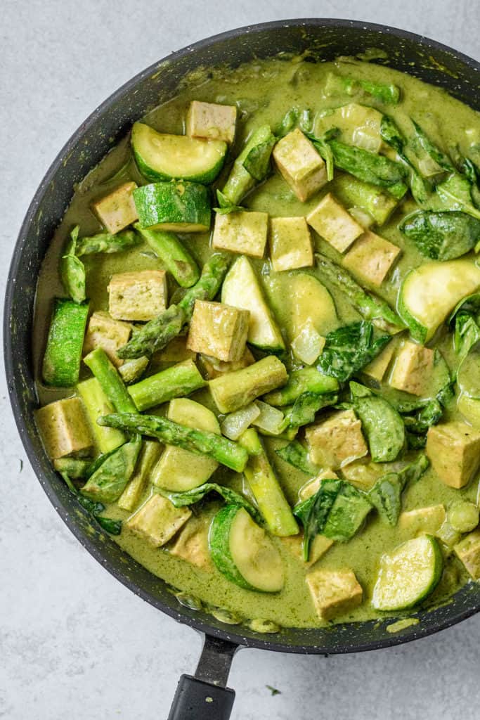 Vegetables mixed into the coconut sauce and tofu.