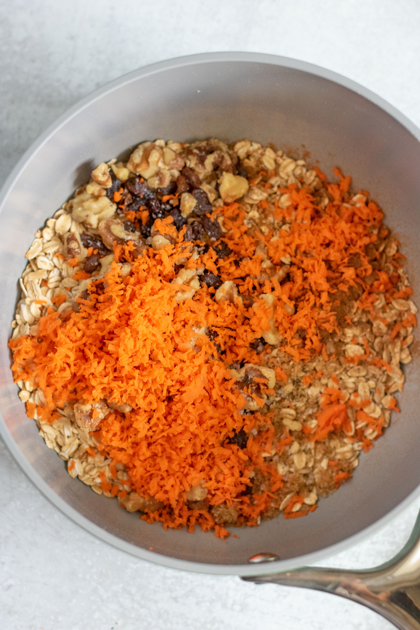 Dry ingredients for the oats plus the shredded carrots.