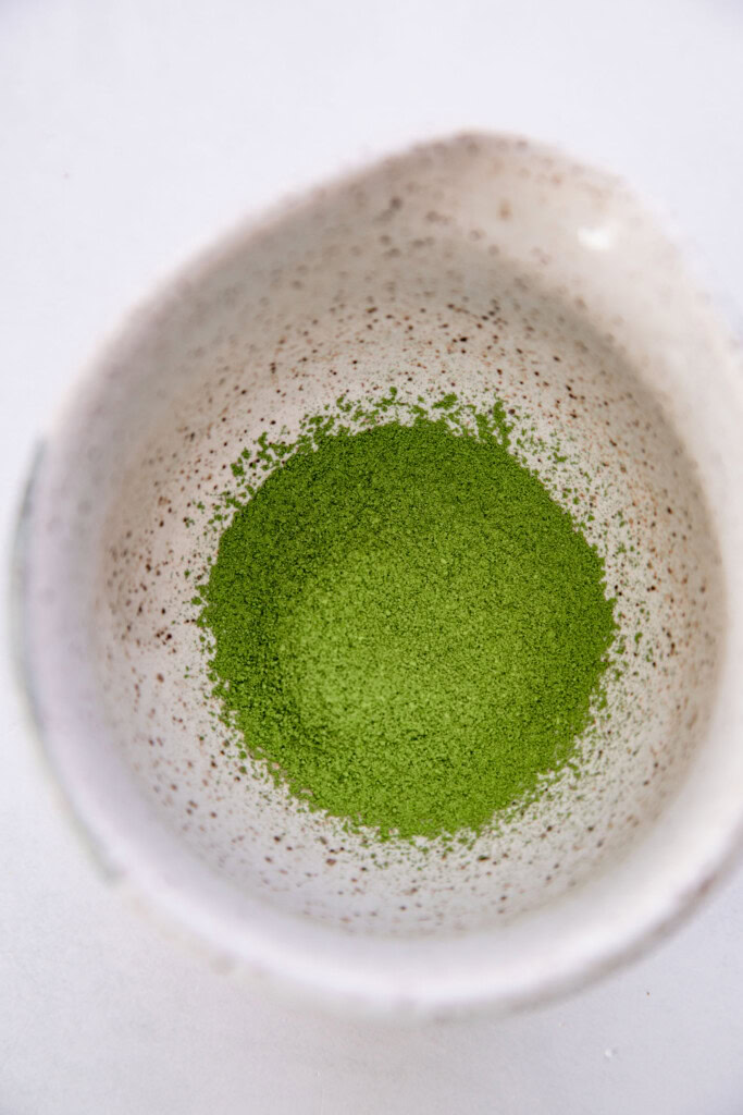 Sifted matcha powder in a matcha bowl.