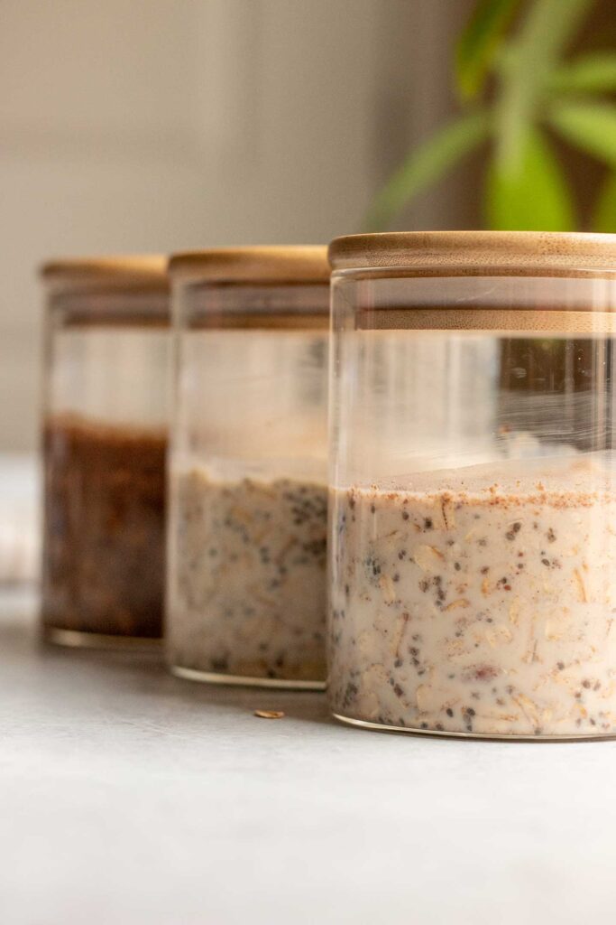 Soaking the different overnight oats in individual jars.