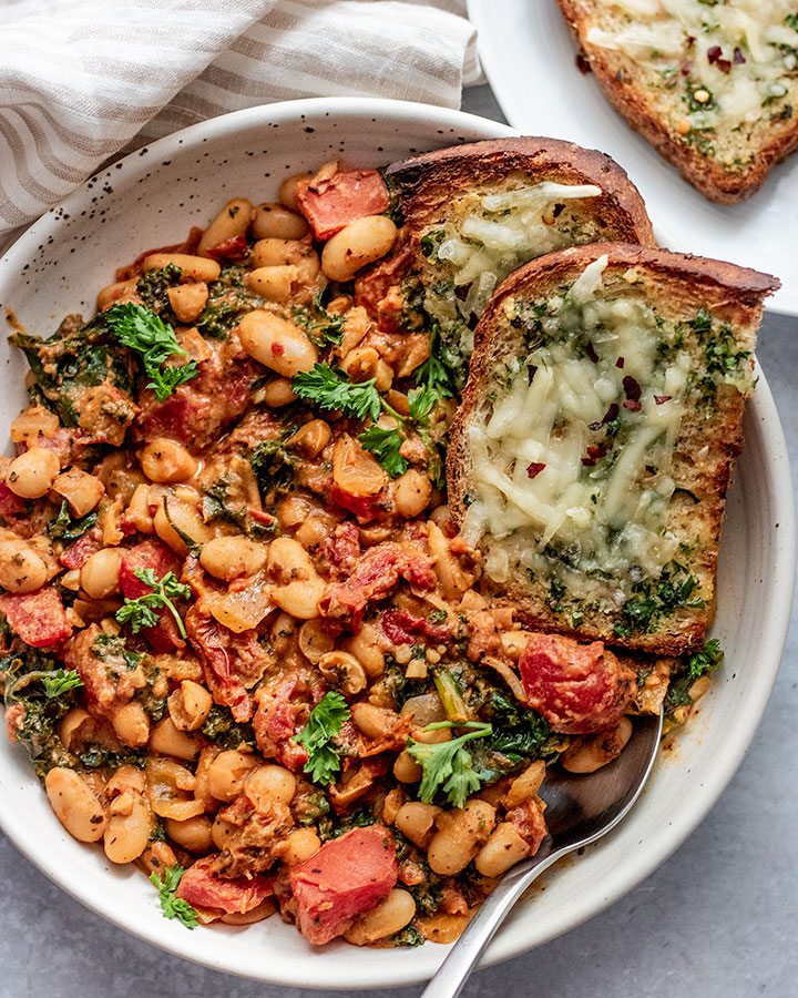 Sun-Dried Tomato White Bean Skillet with Garlic Bread