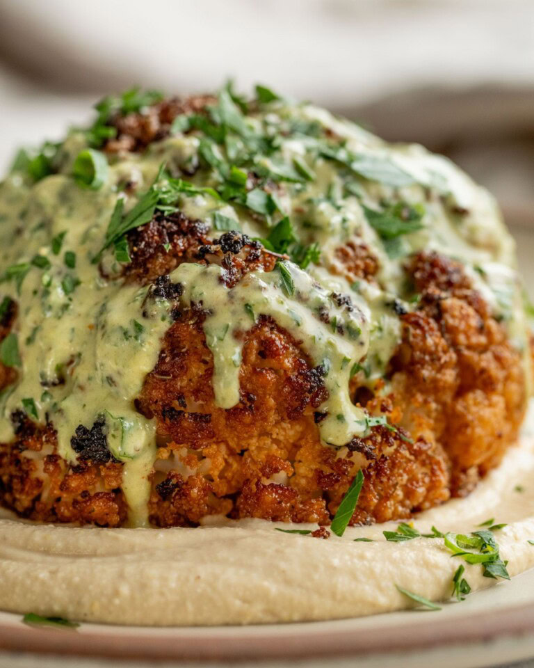 Whole Roasted Cauliflower with Creamy Scallion Date Dressing